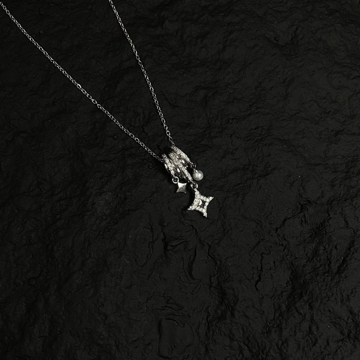 Silver-Tone Multi-Charm Star Necklace